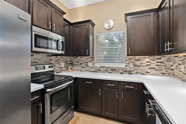 kitchen with backsplash, stainless steel appliances, dark brown cabinetry, and ornamental molding