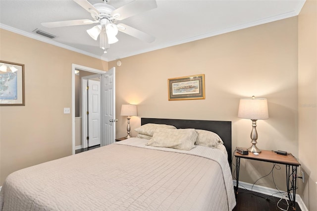 bedroom with ceiling fan, crown molding, and dark wood-type flooring