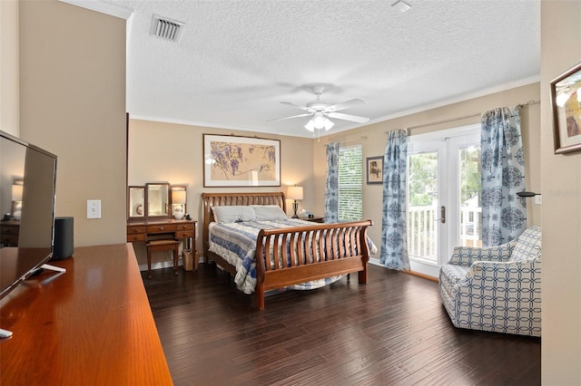 bedroom featuring ceiling fan, dark hardwood / wood-style flooring, crown molding, and french doors