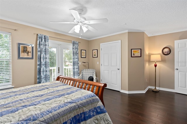 bedroom with access to exterior, ceiling fan, crown molding, and multiple windows