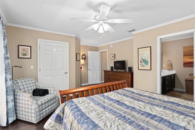 bedroom featuring ensuite bath, ceiling fan, dark hardwood / wood-style floors, ornamental molding, and a textured ceiling