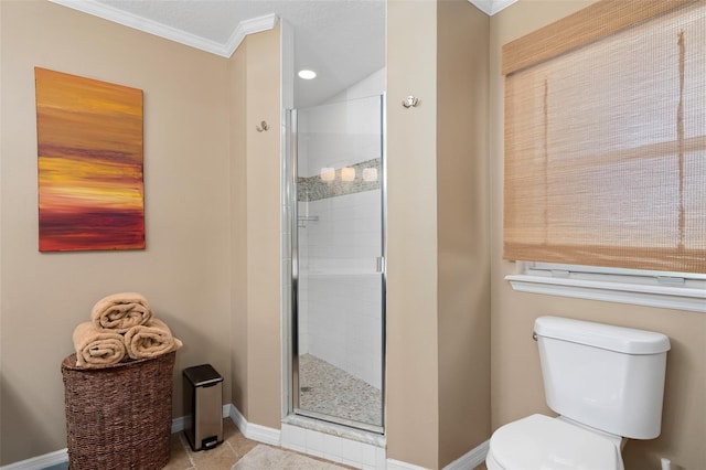 bathroom featuring tile patterned floors, toilet, a shower with door, and crown molding