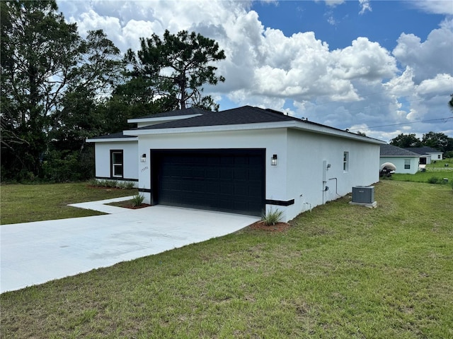 view of home's exterior featuring central AC unit, stucco siding, an attached garage, and a yard