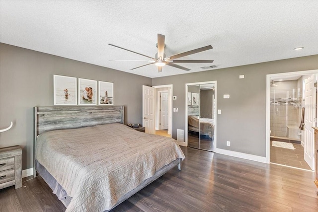 bedroom with ensuite bath, a textured ceiling, ceiling fan, hardwood / wood-style flooring, and a closet