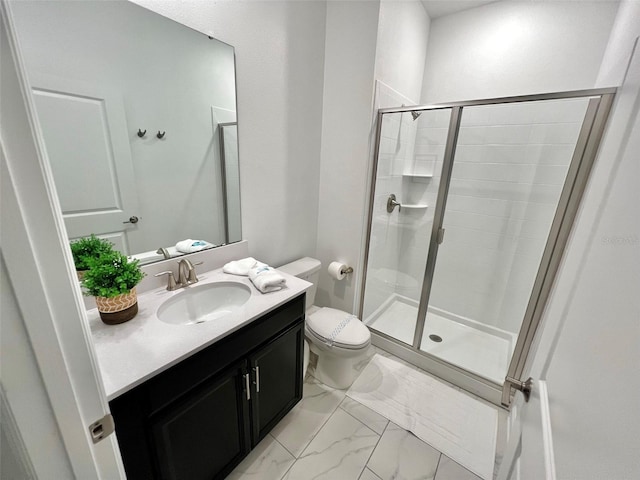 bathroom with vanity, toilet, and walk in shower