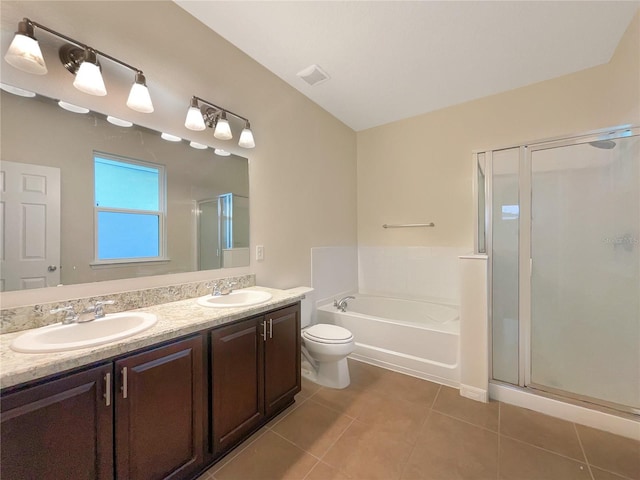 full bathroom featuring plus walk in shower, vanity, tile patterned floors, and toilet