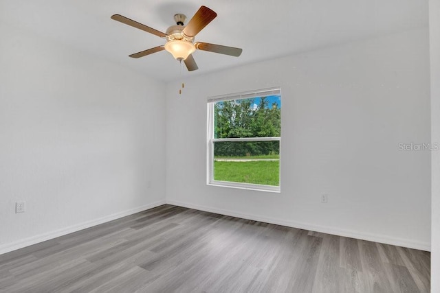 297 Malauka Run, Ocklawaha, FL 32179 - spare room featuring ceiling fan and light wood-type flooring