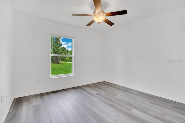 297 Malauka Run, Ocklawaha, FL 32179 - spare room with ceiling fan and light hardwood / wood-style floors