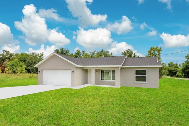 ranch-style home featuring a garage and a front lawn