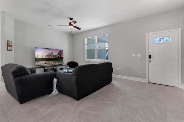 living room with ceiling fan