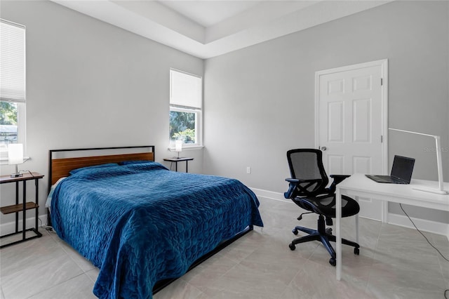 bedroom featuring light tile patterned floors