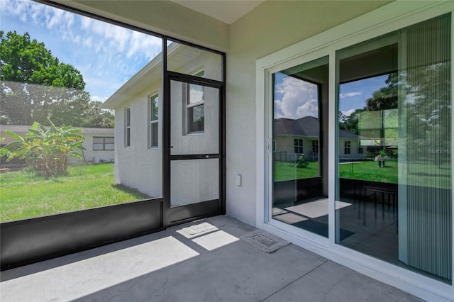 doorway featuring concrete flooring