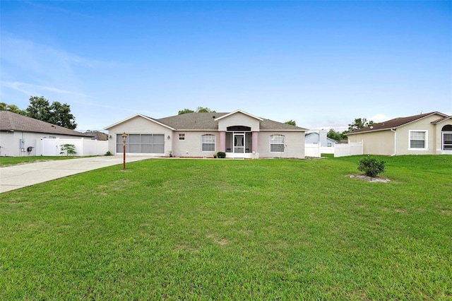 ranch-style house with a front yard and a garage