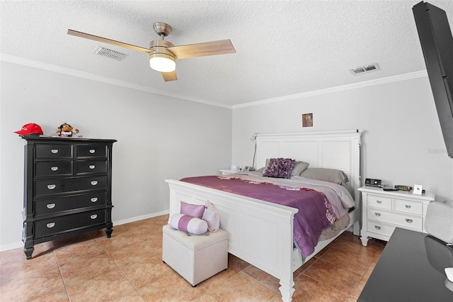 tiled bedroom with a textured ceiling, ceiling fan, and ornamental molding