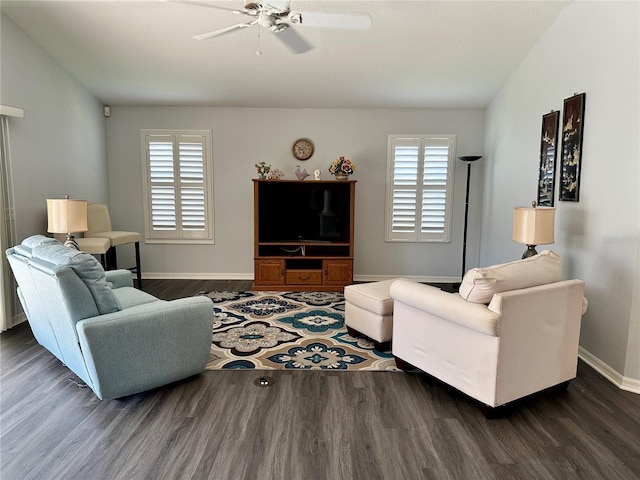 living room with dark hardwood / wood-style floors, plenty of natural light, and ceiling fan