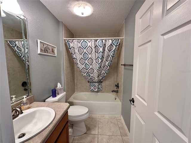 full bathroom featuring shower / bathtub combination with curtain, tile patterned flooring, a textured ceiling, toilet, and vanity