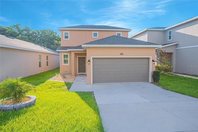 front facade featuring a garage and a front yard