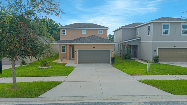 front facade featuring a front yard and a garage