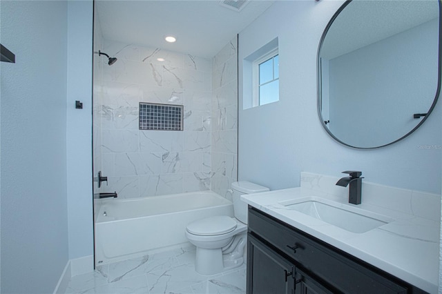 full bathroom with toilet, vanity, and tiled shower / bath combo