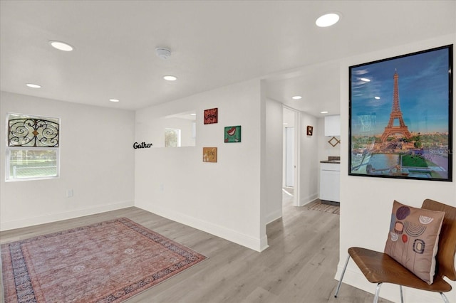 corridor featuring light hardwood / wood-style flooring