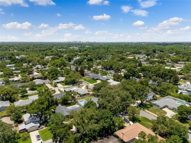 aerial view with a residential view and a wooded view