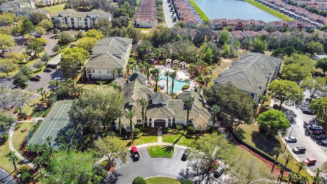 bird's eye view with a water view