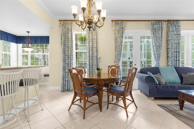 tiled dining area with french doors and crown molding