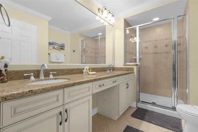 bathroom featuring an enclosed shower, tile patterned flooring, vanity, toilet, and crown molding