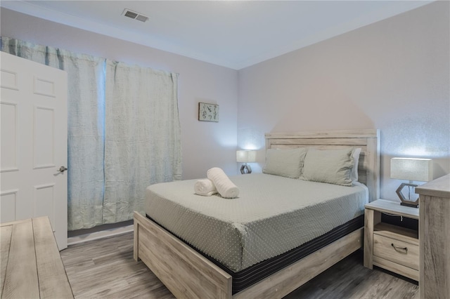 bedroom featuring light hardwood / wood-style floors