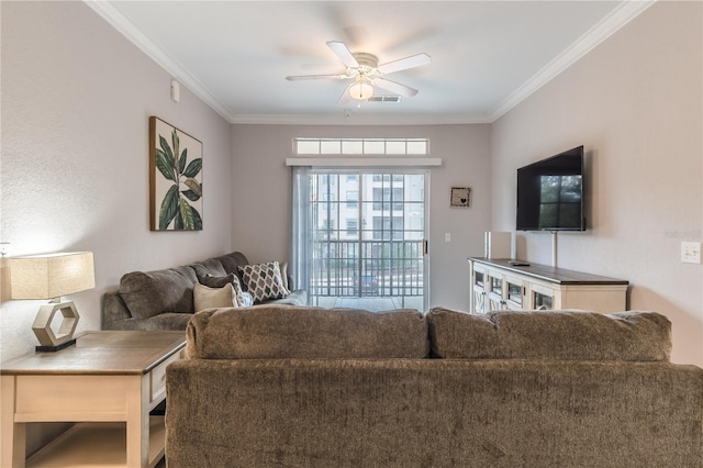 living room featuring crown molding and ceiling fan