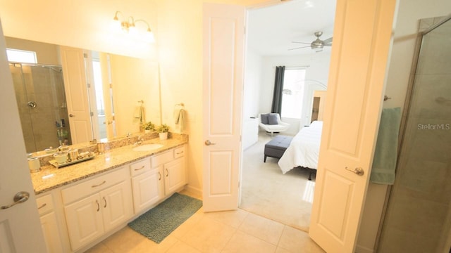 bathroom featuring tile patterned floors, a wealth of natural light, a shower with shower door, and ceiling fan