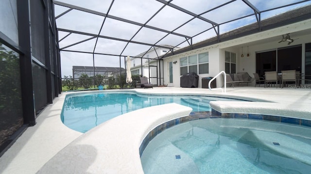 view of pool featuring a patio area and a lanai