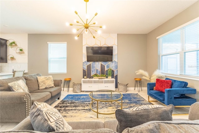 tiled living room featuring a chandelier