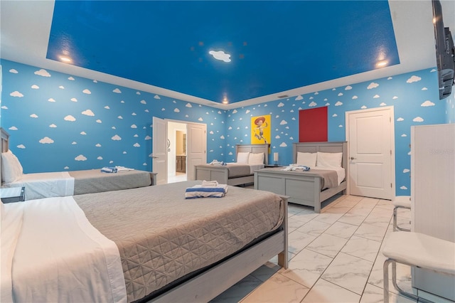 bedroom featuring a tray ceiling