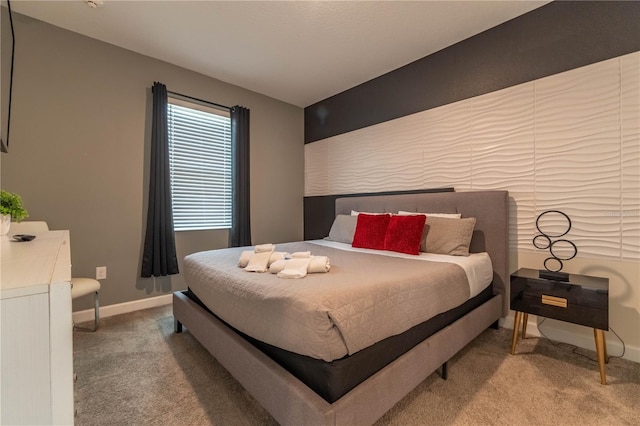 bedroom featuring light colored carpet