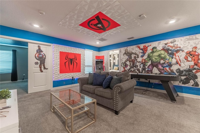 carpeted living room featuring a textured ceiling