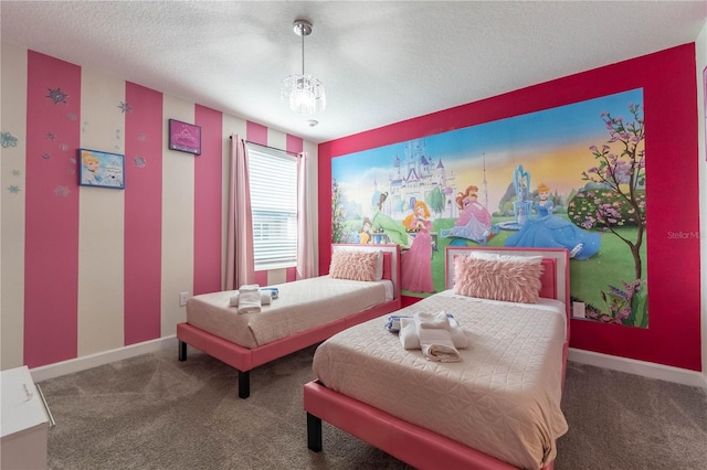 carpeted bedroom with a textured ceiling