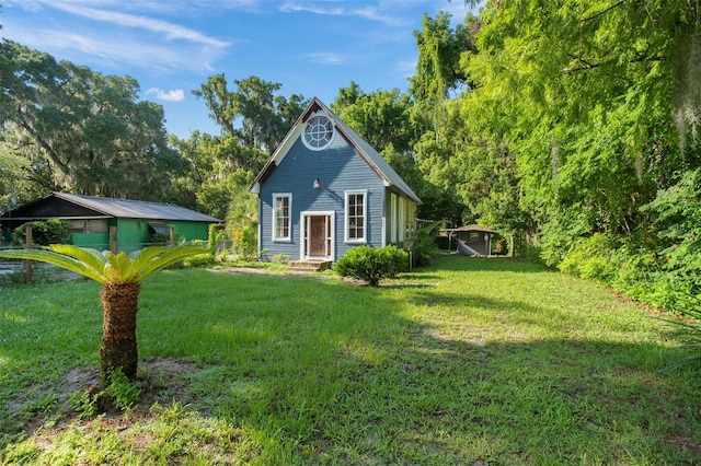 exterior space with a yard