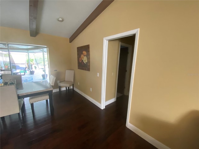 interior space featuring dark hardwood / wood-style floors and lofted ceiling with beams