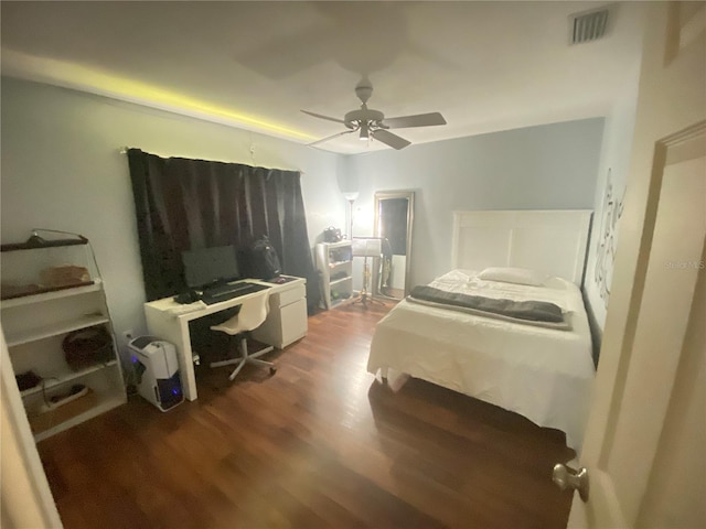 bedroom featuring ceiling fan and hardwood / wood-style flooring