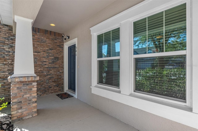 doorway to property with a porch