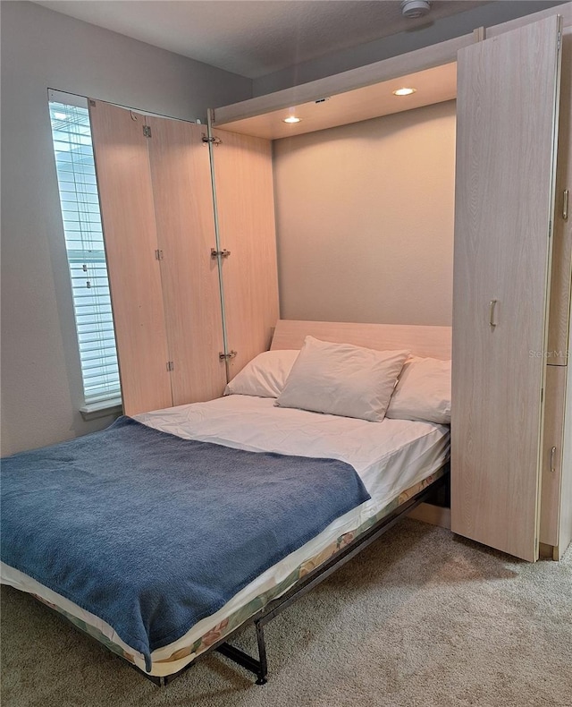 bedroom featuring carpet flooring