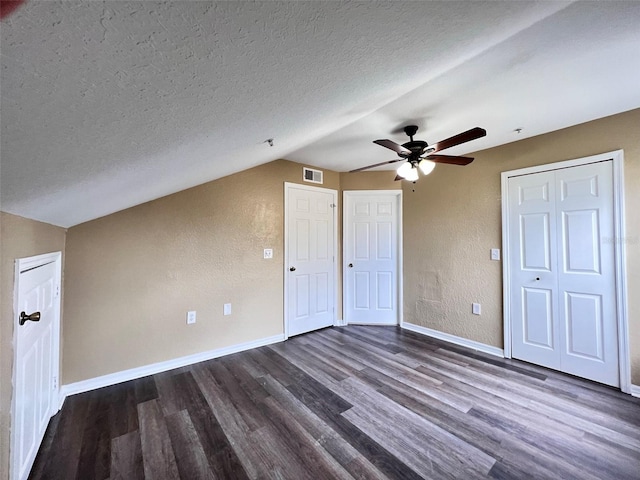 bonus room with a textured ceiling, ceiling fan, hardwood / wood-style floors, and lofted ceiling