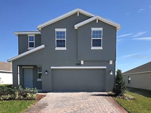 front of property featuring a garage