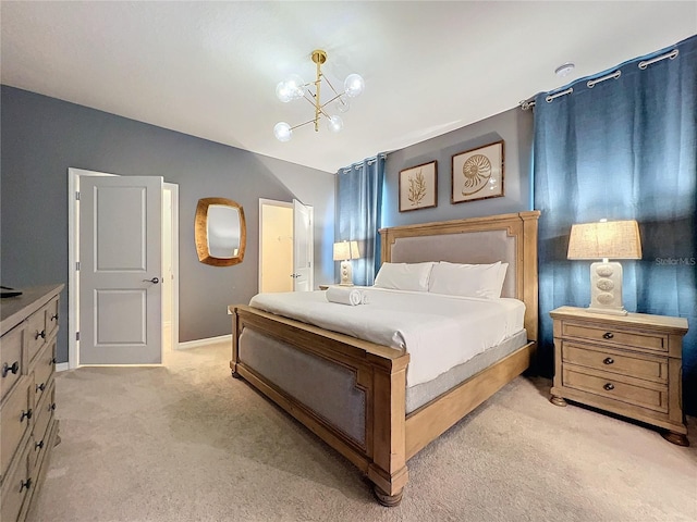 bedroom with light colored carpet and a notable chandelier