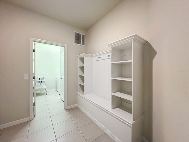 mudroom featuring light tile patterned floors