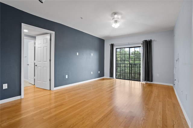 unfurnished room featuring light wood-type flooring