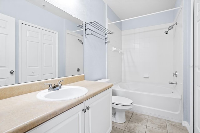 full bathroom with tile patterned floors, vanity, shower / bathtub combination, and toilet