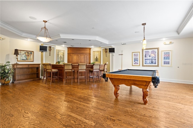 rec room with bar area, dark hardwood / wood-style flooring, a tray ceiling, and billiards