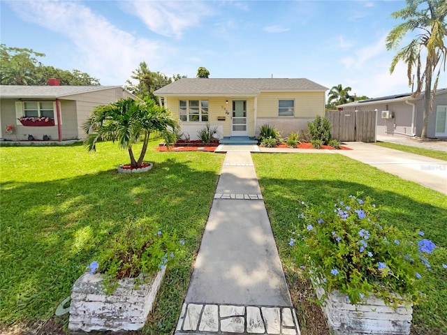 view of front of property with a front lawn